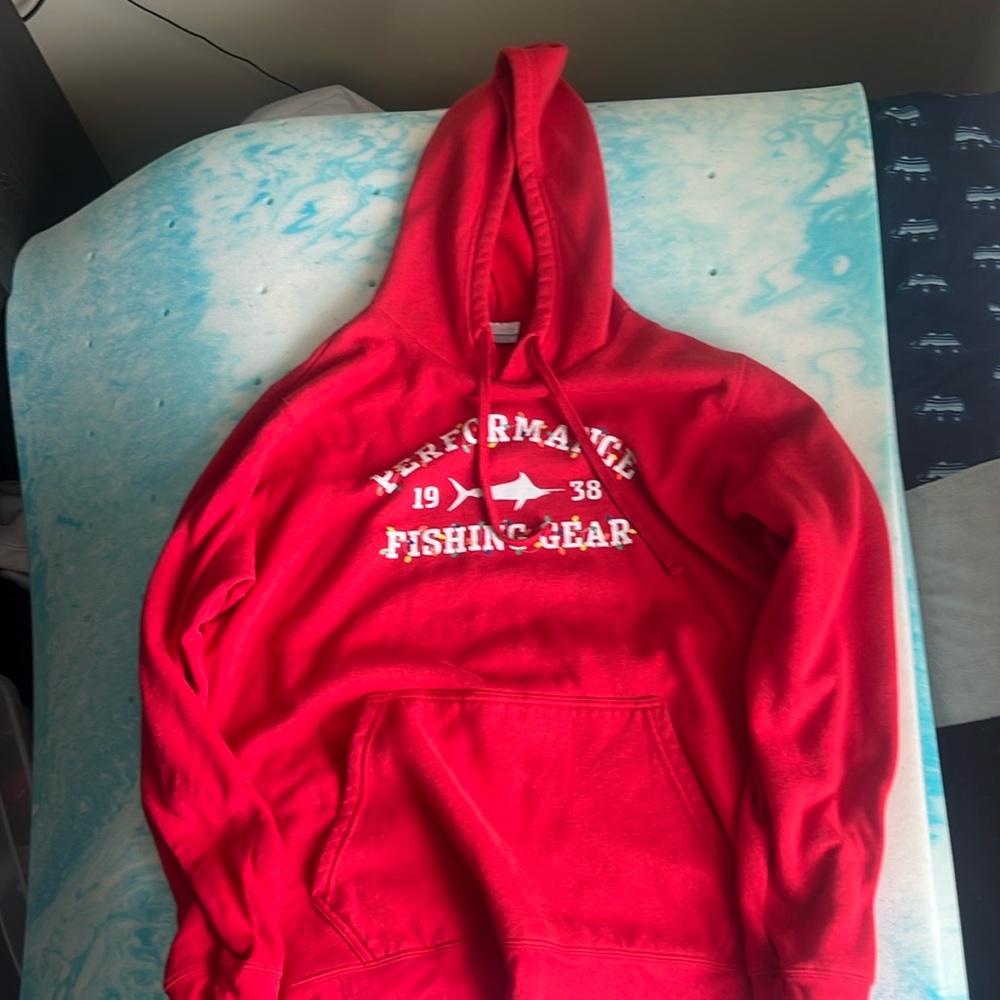 I’m selling a Columba hoodie. Color:red and Christmas light color.  S:Medium